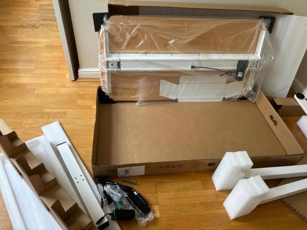 view of our own new purchase testing flexispot ef1b uk desk office working office desk for multiple monitors unboxing package arrival several weeks to months