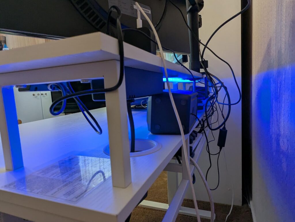 view of our own new purchase testing offigo desk with cable management tray unboxing package arrival several weeks to months