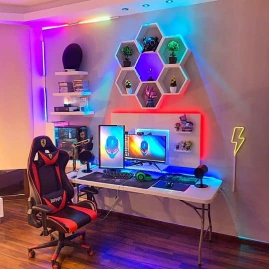 aesthetic gaming setup with wall decor