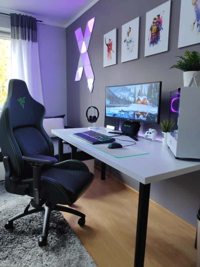 gaming room setup with a white top desk