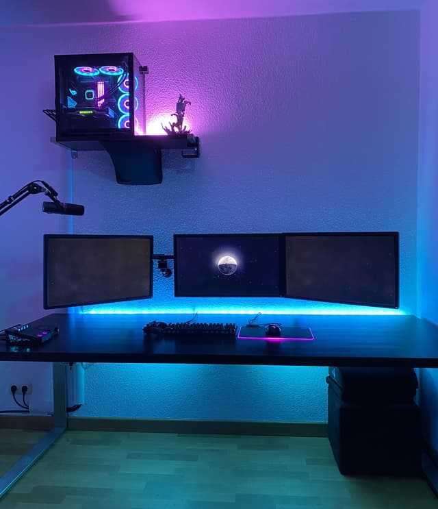 minimalist desk setup with led strips
