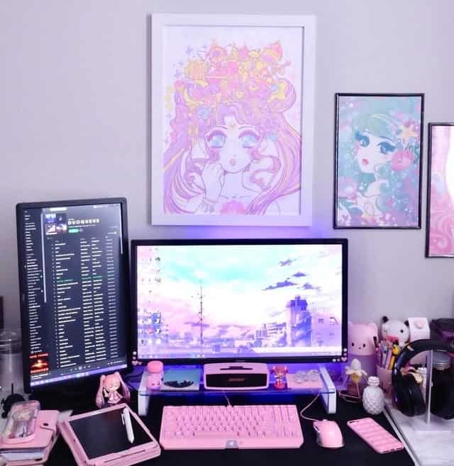 pink black themed gaming room setup
