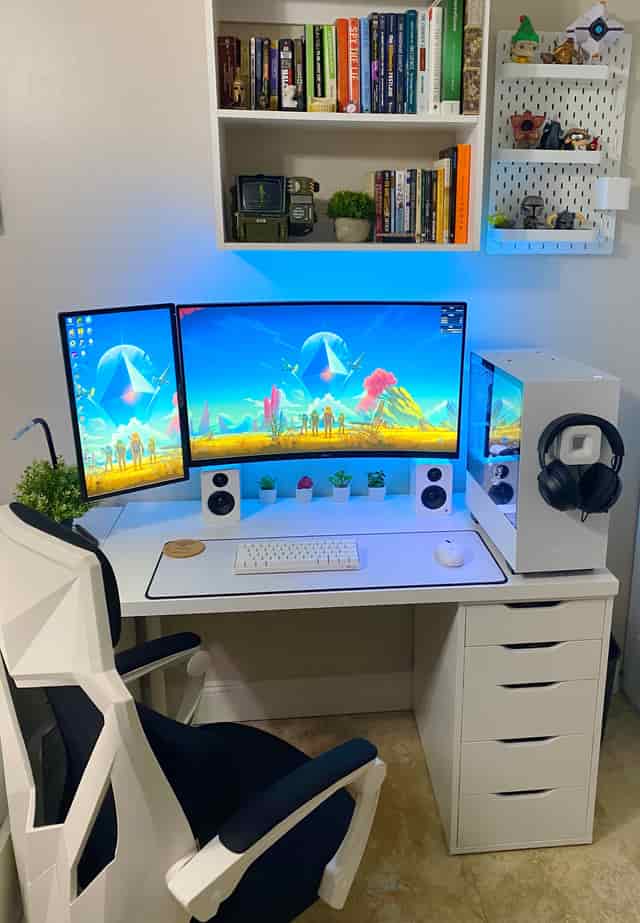 well organized white battlestation for small rooms
