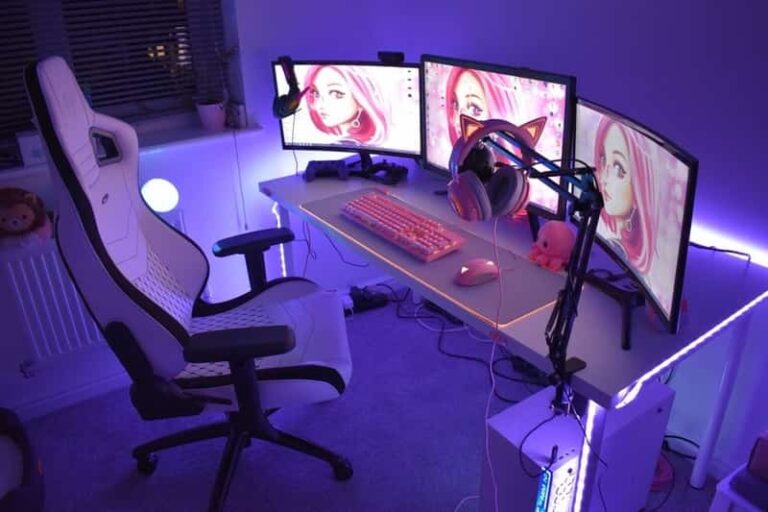 white desk setup with 3 monitors 768x512